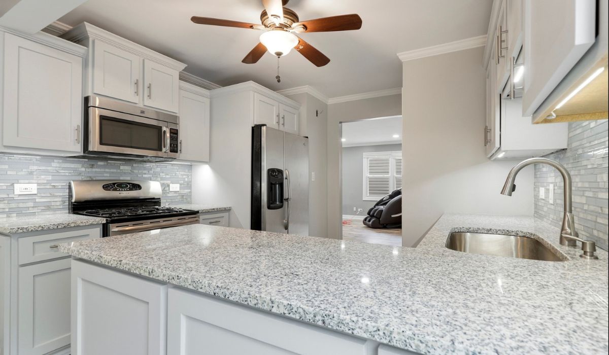 kitchen area with granite countertops