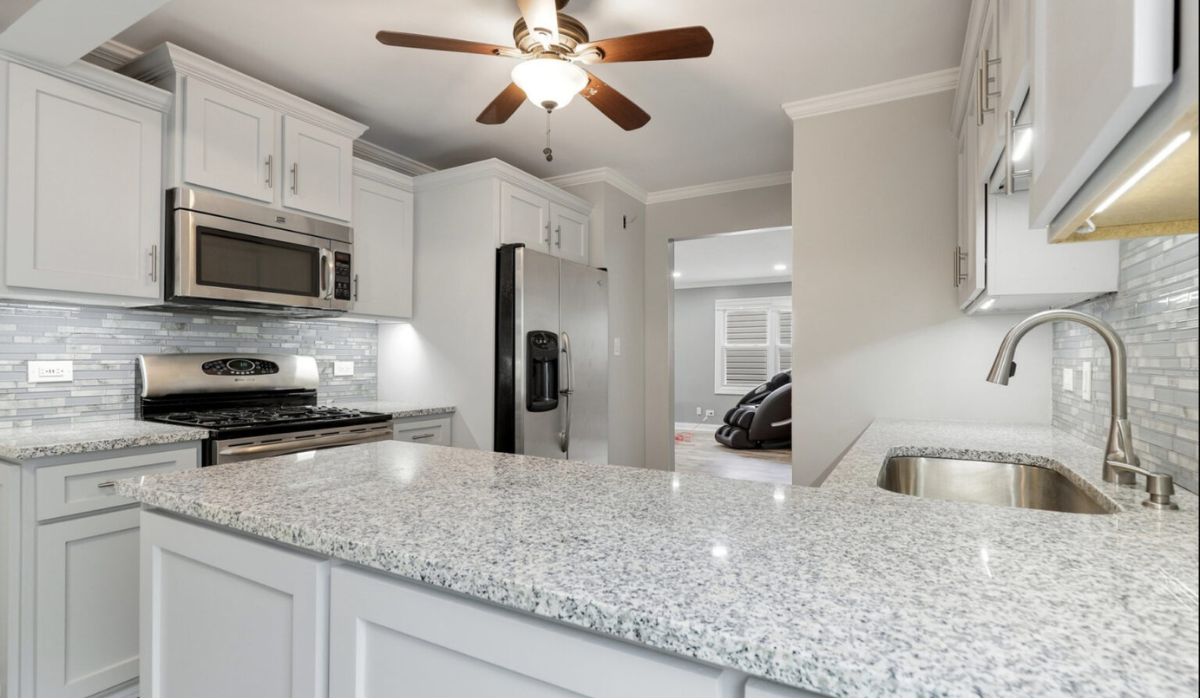 kitchen area with granite countertop